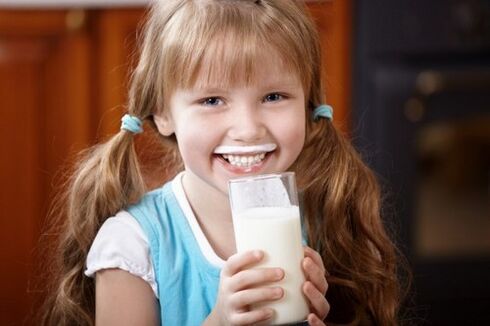 the girl drinks kefir to prevent parasites